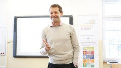 Tesco Slovakia CEO Martin Dlouhy introduces a workshop at a secondary school in Bratislava designed to help young people develop soft skills