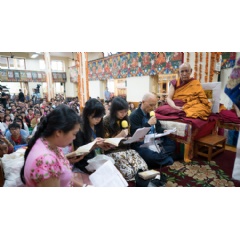 A group of laypeople reciting the