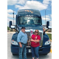 The Danny Herman Trucking driver team of Ronnie Miller and his wife, Margaret, enjoy their Kenworth T680 with a 76-inch sleeper and PACCAR MX-13 engine.