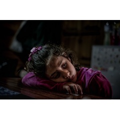Mariem, 8, a refugee from the Syrian Arab Republic, in her family’s shelter in Pikpa Village, an open refugee camp run by volunteers outside of Mytilini, Lesvos, Greece, Tuesday 14 March 2017. © UNICEF/UN057954/Gilbertson VII Photo