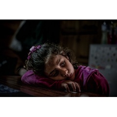 Mariem, 8, a refugee from the Syrian Arab Republic, in her familys shelter in Pikpa Village, an open refugee camp run by volunteers outside of Mytilini, Lesvos, Greece, Tuesday 14 March 2017.  UNICEF/UN057954/Gilbertson VII Photo