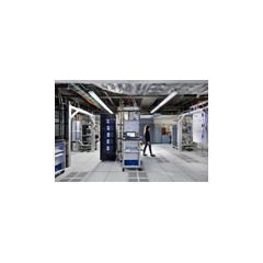 IBM Q computation center - Inside the first IBM Q computation center, dilution refrigerators with microwave electronics (middle) that operate IBM Q Network clients’ cloud access to 20 qubit processor. (Credit: Connie Zhou)