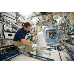 Expedition 50/51 Flight Engineer Thomas Pesquet of ESA (European Space Agency) inserts blood tubes into the Minus Eighty-Degree Laboratory Freezer aboard the International Space Station on Nov. 21, 2016. Credits: NASA