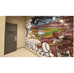 SunTrust Park in Atlanta, Georgia, celebrates a new partnership between the Atlanta Braves and American Standard with the bold hallway murals that blend views of the building with the brand’s popular plumbing fixtures.