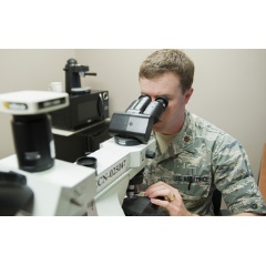 Maj. Michael McFall, a 96th Medical Group pathologist, looks through a microscope to study a patient’s tissue April 21, 2016, at Eglin Air Force Base, Florida.
Credit: U.S. Air Force photo/Ilka Cole