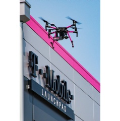 A drone flies in front of T-Mobile’s Launch Pad, home to the Tech Experience and the Un-carriers national technology lab