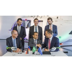 Executives from Milestone, Airbus and Aramco commemorate award of five H145 helicopters.