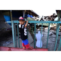  UNICEF/ UN0241241/ Wilander

In Indonesia, Muhamad Akbar, 4 years old, plays in front of the ruins of the building damaged during the earthquake in Palu, South Sulawesi.