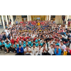 His Holiness the Dalai Lama poses with the 23 teams of young Tibetans from Europe, America and many parts of India, who are participating in the 25th Gyalyum Chenmo Memorial Gold Cup football tournament in the Main Tibetan Temple courtyard in Dharams