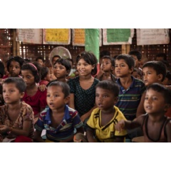  UNICEF/UN0326961/Brown
Children recite a lesson at a UNICEF-backed learning space in the Kutapalong Rohingya refugee mega camp in Coxs Bazar, Bangladesh.