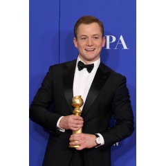 Taron Egerton, winner of Best Performance by an Actor in a Motion Picture - Musical or Comedy for Rocketman, poses in the press room during the 77th Annual Golden Globe Awards at The Beverly Hilton Hotel. (Photo by Kevin Winter/Getty Images)