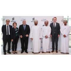 Ericsson and Omantel executives at a signing ceremony for the managed services contract expansion.