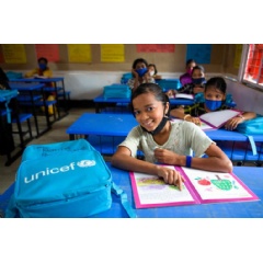  UNICEF/UN0581213/Kiron

A Rohingya refugee child attends a class under the Myanmar Curriculum Pilot at a learning centre in Ukhiya, Coxs Bazar in January 2022.