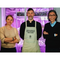 Christiane Dolva, Strategy Lead Planet Positive at H&M Foundation, Martin Wall, Executive Chef and Planet Keeper at Fotografiska and Edwin Keh, CEO at HKRITA standing in front of Fotografiskas hydroponic garden, where the CO2 is released at night.