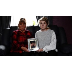 Pictured is the family of Dawn Walker, whose story is told in #Dead2Me. Pictured is mother, Ginny Walker (L), and Dawn Walker’s daughter Keira-Lee Guest (R) (holding a framed photo of Dawn with her two sisters)