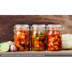 Various kimchi (kimchi cabbage, cucumber and radish) in jar, Korean food