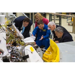 Vice President Mike Pence, second from right, looks at the Orion capsule that will fly on the first integrated flight with the Space Launch System rocket in 2019. Credits: NASA/Aubrey Gemignani
