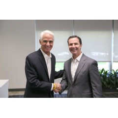Congressman Charlie Crist (l) meets with Harris Corporation Chairman, President and CEO Bill Brown (r) during a visit to the company’s Global Innovation Center in Melbourne, Florida.