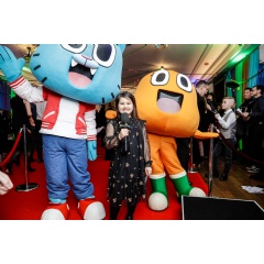 BAFTA Young Presenter Gracie Gosling interviewing on the red carpet with Gumball & Darwin. BAFTA/Thomas Alexander