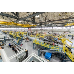Sikorsky employees building CH-53K® aircraft utilizing 3-D work instructions, new titanium machining centers with multi-floor ergonomic platforms.