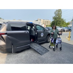 Wavelene Leone stands beside an accessible Sienna that was given to Putnam County Aging Program as part of a mobility study done in conjunction with the Community Transportation Association of America.